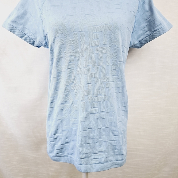 Athleta Allover Graphic Seamless Running Tee size Large - Picture 4 of 8